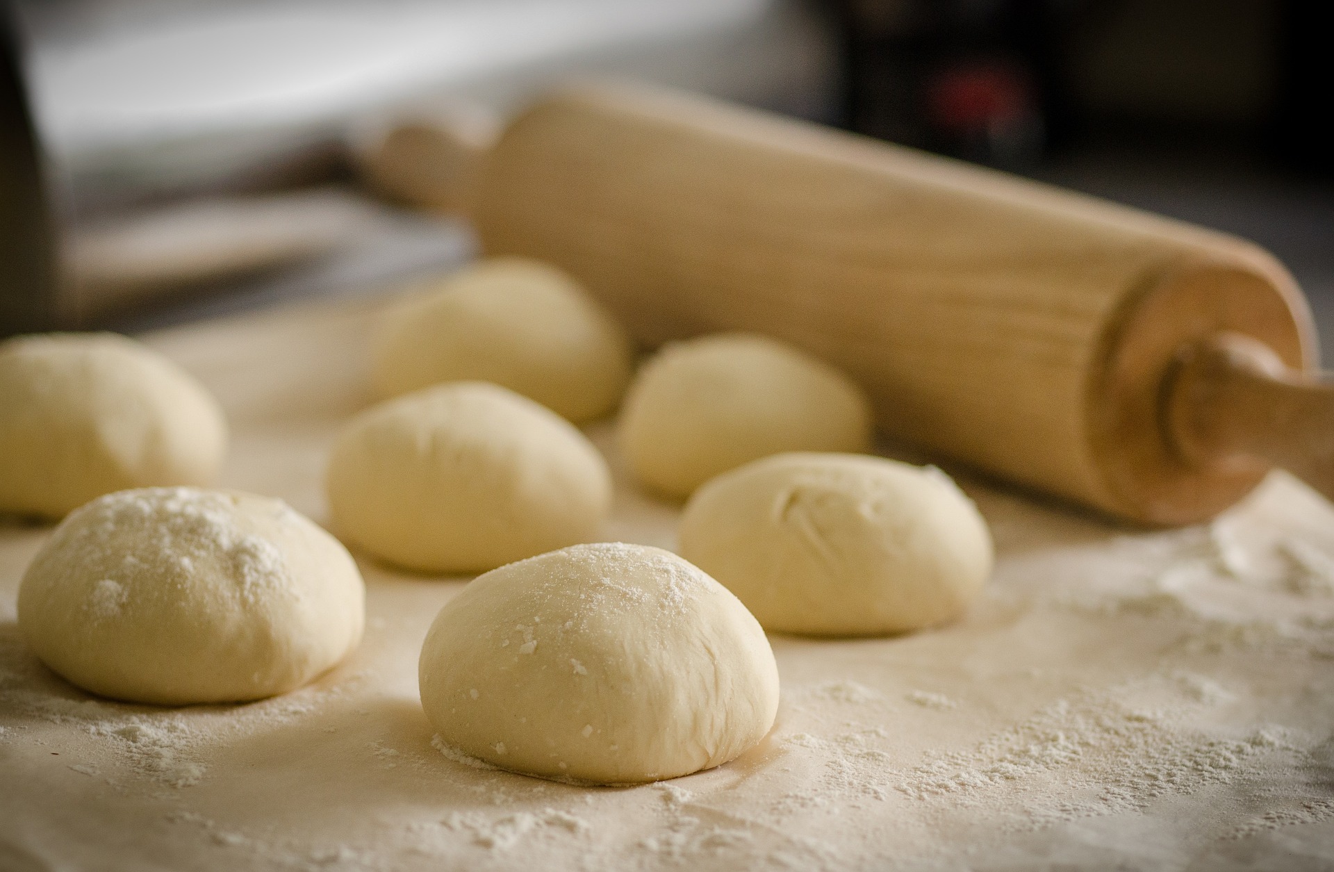 hand made pizza dough in balls ready to be stretched and topped